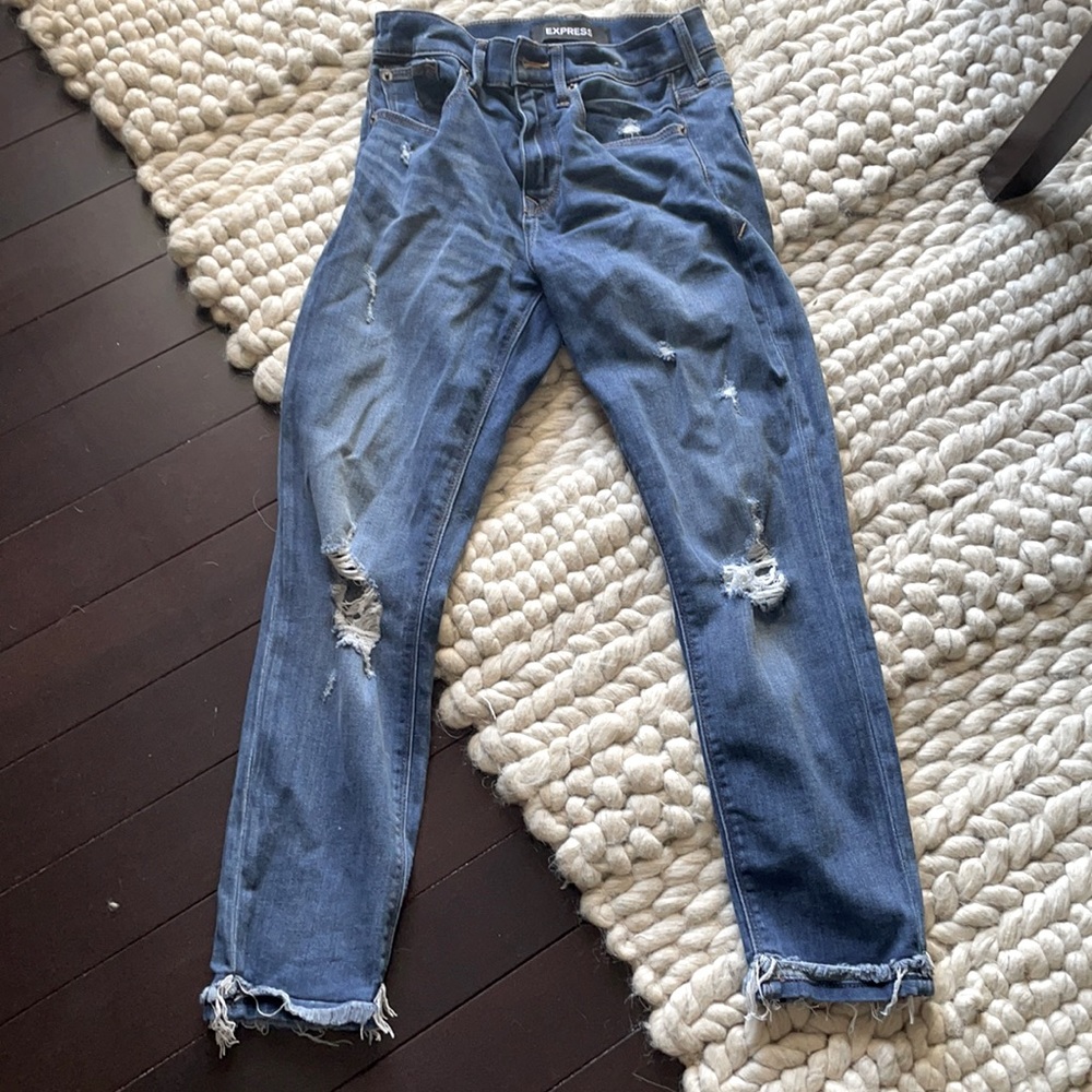 Express distressed Denim.  Super Skinny Mid Rise